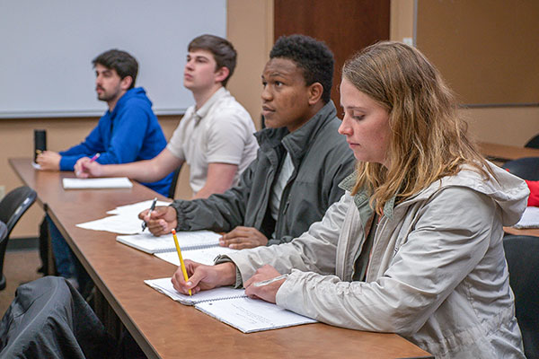 students taking notes during class