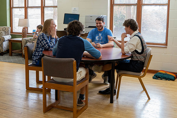 students studying at round table