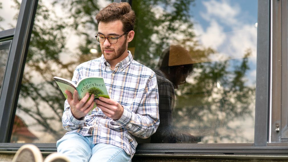 Jon Hill '22 reading Life Together