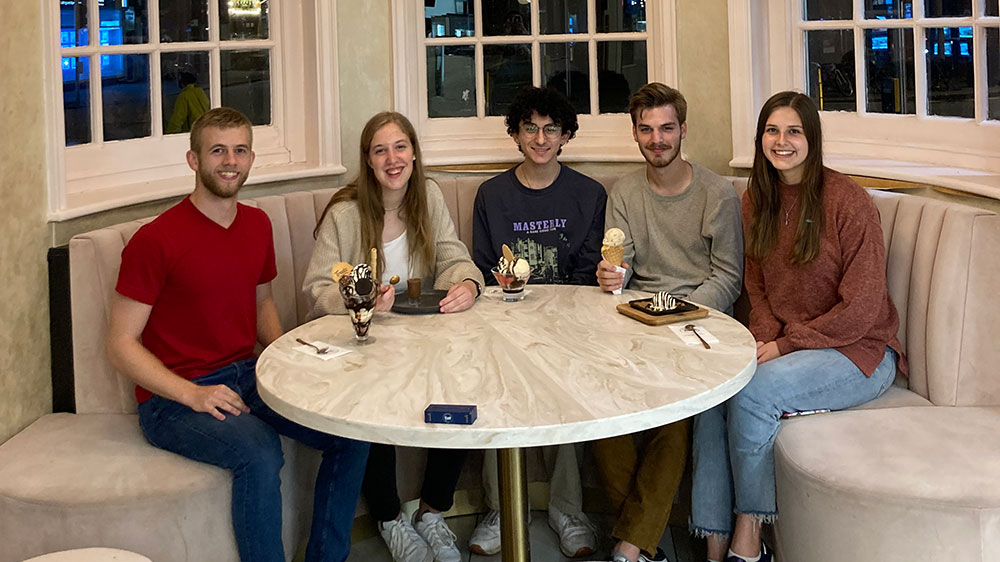 students at dinner table