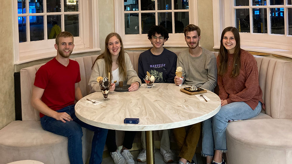 students at dinner table