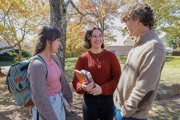 students talking outside